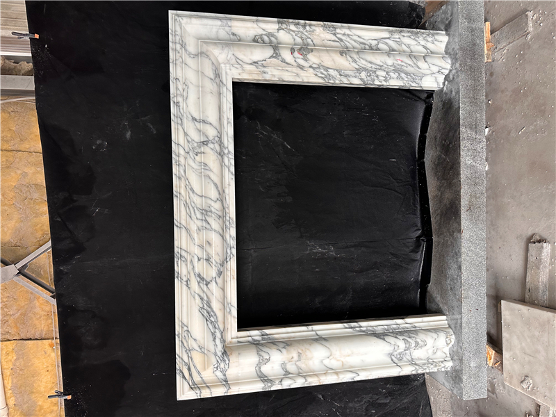 Arabescato solid bolection surround / marble mantels